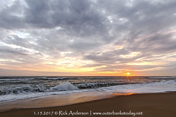 A quick burst of sunlight just after sunrise on the Outer Banks